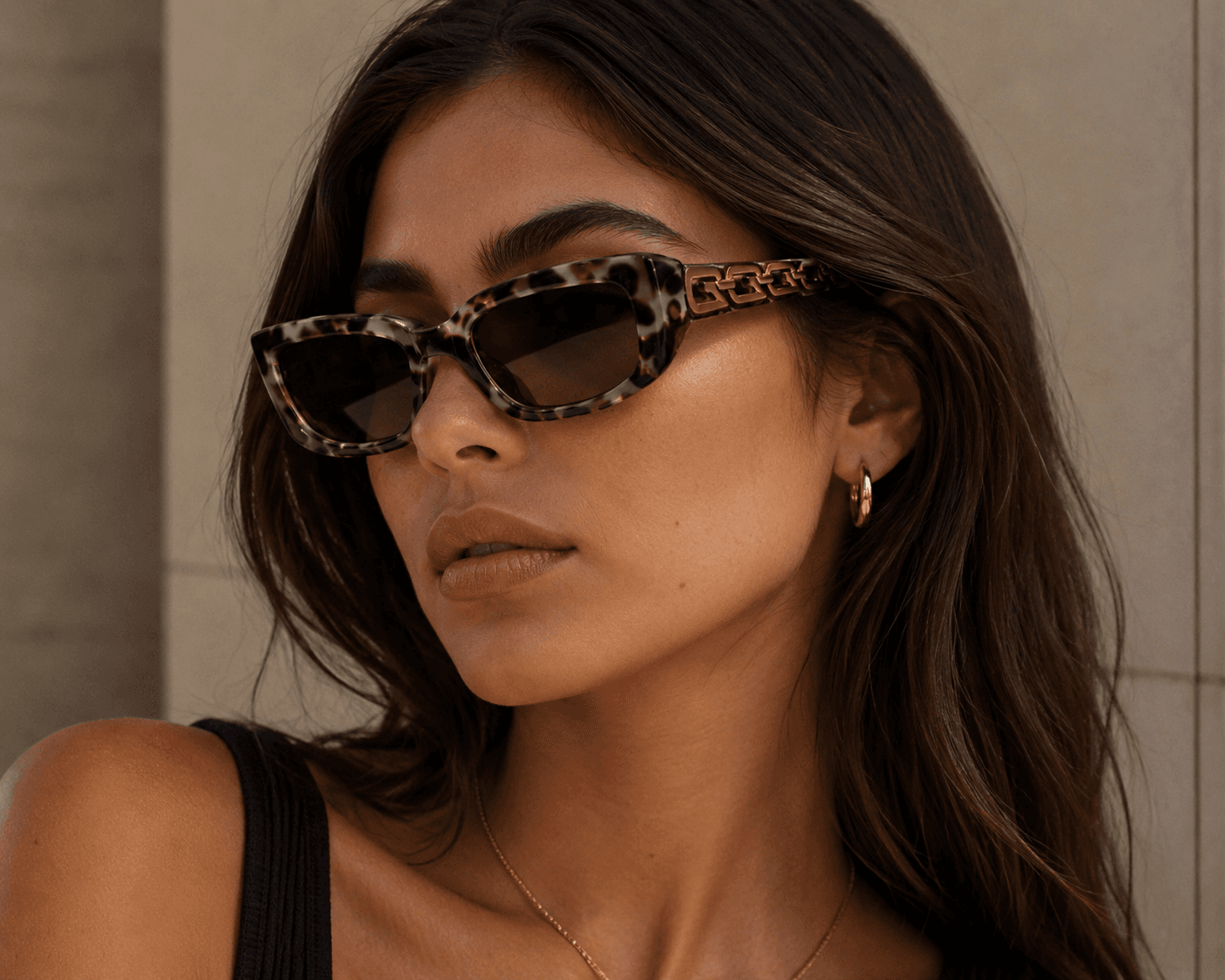 Woman wearing tortoiseshell GR sunglasses